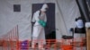 Uganda set to begin Ebola vaccine trial after new outbreak kills nurse