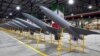 FILE - In this picture released by the official website of the Iranian army on April 20, 2023, Iran-made drones are displayed. The Ministry of Defense said it delivered more than 200 long-range strategic drones to the army. (Iranian army via AP)