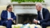 Colombian President Gustavo Petro, left, listens to U.S. President Joe Biden as reporters yell questions in the Oval Office of the White House in Washington, April 20, 2023. (Susan Walsh/AP Photo)
