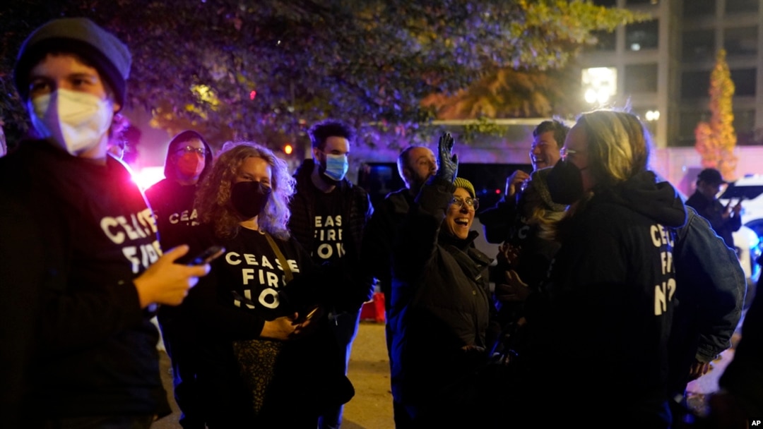 Protesters cheer outside the Democratic National Committee headquarters Nov. 15, 2023, in Washington.