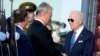 U.S. President Joe Biden is greeted by Lithuania's President Gitanas Nauseda as he arrives at Vilnius International Airport, in Vilnius, Lithuania, July 10, 2023.