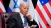 FILE - U.S. President Joe Biden listens as he and Israeli Prime Minister Benjamin Netanyahu participate in an expanded bilateral meeting with Israeli and U.S. government officials on Oct. 18, 2023, in Tel Aviv.