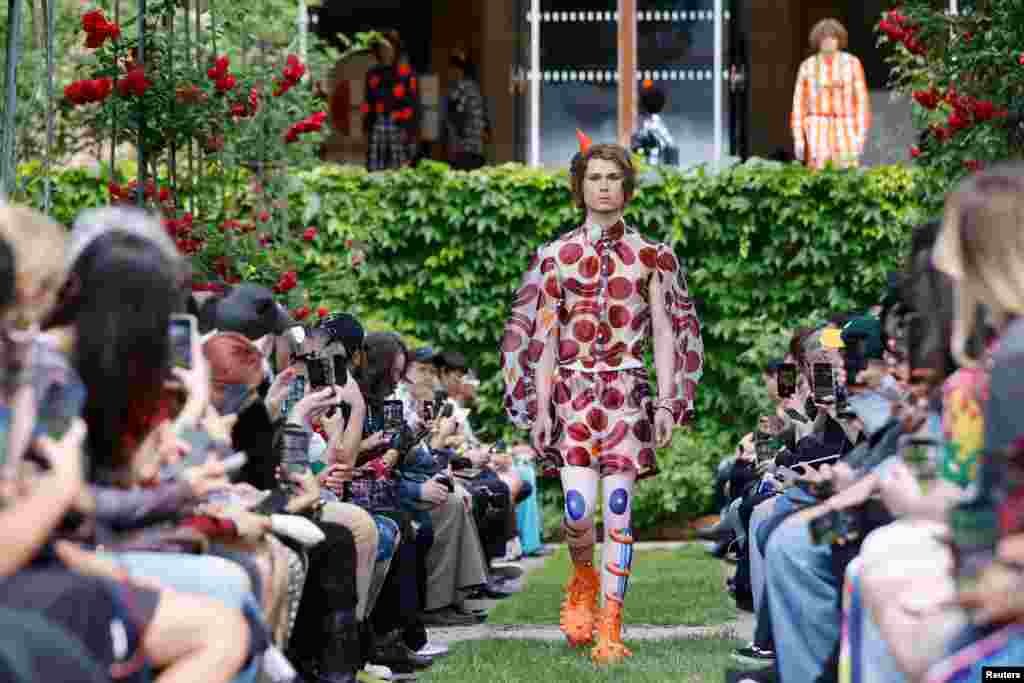 A model presents a creation by designer Walter Van Beirendonck as part of his Menswear ready-to-wear Spring Summer 2025 collection show during Men's Fashion Week in Paris, France.