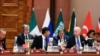 US President Joe Biden, right, speaks with British Prime Minister Rishi Sunak, center, as US Secretary of State Antony Blinken, second from left, and Turkish President Recep Tayyip Erdogan watch, at the G20 summit in New Delhi, India, Sept. 9, 2023.
