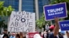 People rally outside the Wilkie D. Ferguson Jr. US Courthouse, June 13, 2023, in Miami.