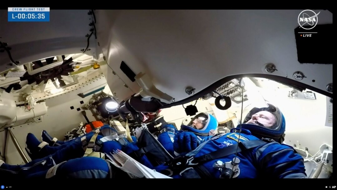 FILE - NASA astronauts Butch Wilmore and Suni Williams wait for liftoff inside the Boeing Starliner capsule at Space Launch Complex 41, June 5, 2024, in Cape Canaveral, Fla. (NASA via AP)