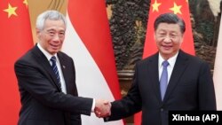 中國領導人習近平在北京會晤到訪的新加坡總理李顯龍。（2023年3月31日）