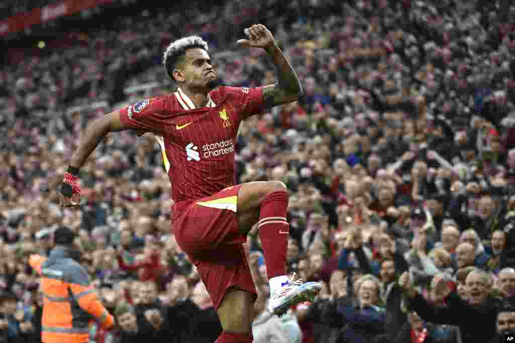 Liverpool's Luis Diaz celebrates after scoring his side's opening goal during the English Premier League soccer match between Liverpool and Brentford at Anfield Stadium, Liverpool, England.