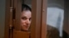 FILE - Wall Street Journal reporter Evan Gershkovich in a courtroom in Moscow, Apr. 18, 2023. The Biden administration has sanctioned Russia's Federal Security Service and Iran's Islamic Revolutionary Guard Corps intelligence organization for wrongfully detaining Americans.