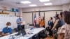 Officers sort received overseas absentee ballots, preparing to pack in diplomatic pouches and send them back to count in Thailand at the Royal Thai Consulate-General of Los Angeles, CA.