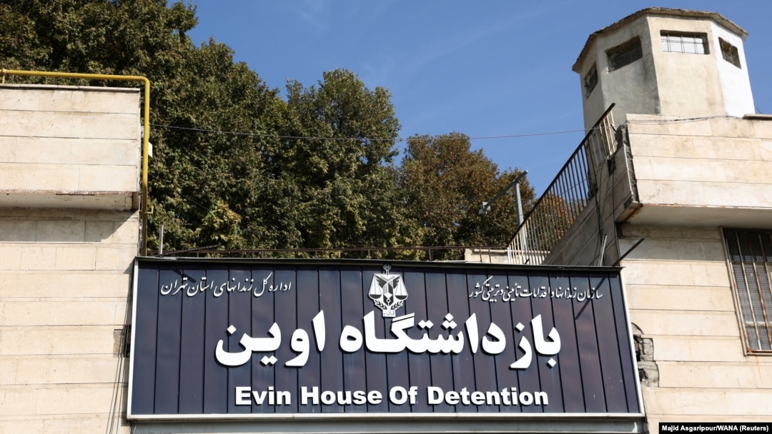 This sign hangs at the entrance to Evin prison in Tehran, Iran, Oct. 17, 2022. (West Asia News Agency via Reuters)