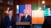 President Joe Biden speaks at the Windsor Bar and Restaurant in Dundalk, Ireland, April 12, 2023. Micheál Martin, Tánaiste of Ireland, listens at left.