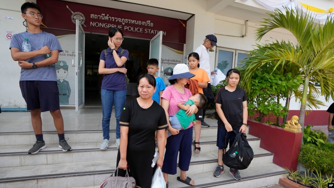 Members of the Shenzhen Holy Reformed Church, also known as the Mayflower Church, leave from the Nongprue police station on their way to Pattaya Provincial Court in Pattaya, Thailand, on March 31, 2023.
