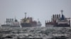 FILE - Vessels await inspection under the Black Sea Grain Initiative in the southern anchorage of the Bosphorus at Istanbul, Turkey, Dec. 11, 2022. 
