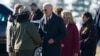 U.S. President Joe Biden and first lady Jill Biden greet people at they arrive near Valley Forge, Pennsylvania, Jan. 5, 2024. 