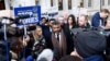 Toufique Hossain representing asylum seekers, speaks to the media outside the Supreme Court following its ruling on whether the government can go ahead with its plan to deport migrants to Rwanda, in London, Nov. 15, 2023. 