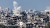This picture taken from Israel's southern city of Sderot shows a smoke plume erupting during Israeli bombardment in the northern Gaza Strip, Oct. 19, 2023