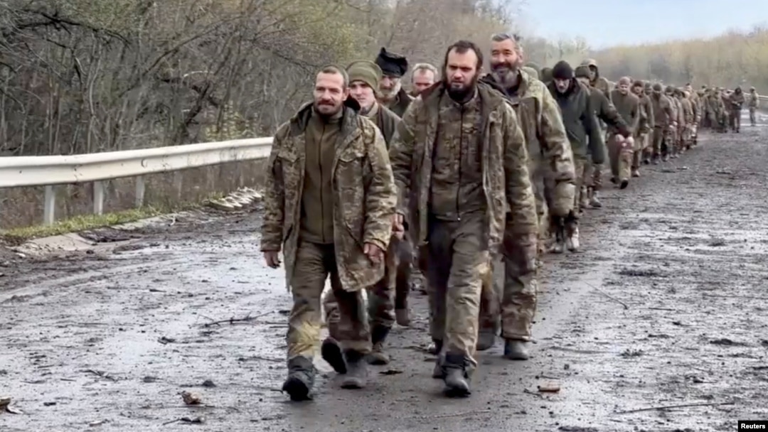 FILE - Ukrainian prisoners of war are seen during a swap for captured Russian soldiers at an undisclosed location in Ukraine, in this screengrab from a handout video released April 16, 2023. (Coordination Headquarters for the Treatment of Prisoners of War/Handout via Reuters)