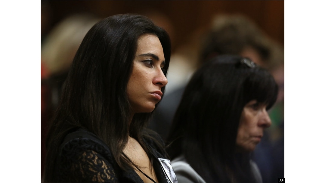 Kim Myers, a friend of the late Reeva Steenkamp, listens to a witness testify at the murder trial of Oscar Pistorius, in Pretoria, South Africa, on May 6, 2014