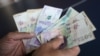 Peso colombiano supera la barrera de los 5.000 por dólar