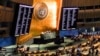 FILE - Video monitors show member nation votes in the United Nations General Assembly in favor of a resolution condemning Russia's illegal referendum in Ukraine, Oct. 12, 2022 at U.N. headquarters.