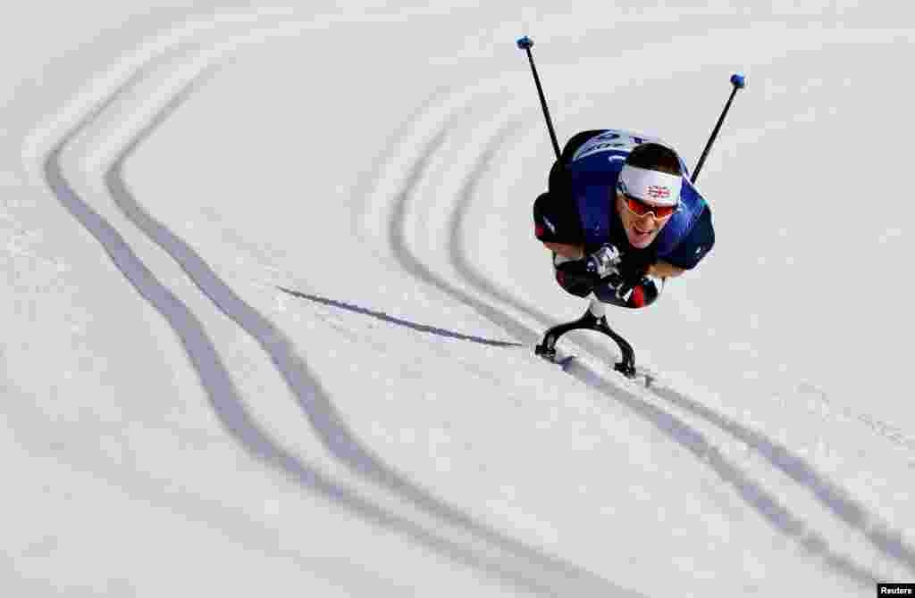 Scott Meenagh of Britain competes in the men's long distance sitting event at the National Biathlon Center in Zhangjiakou, China during the Beijing 2022 Winter Paralympic Games.
