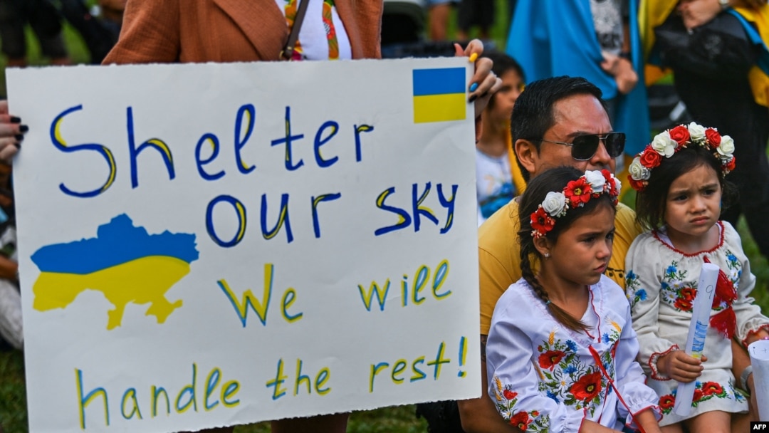 Members and supporters of the Ukrainian community gather to rally in support of Ukraine in Miami, Florida, on March 5, 2022.