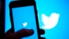 FILE - The Twitter application is seen on a digital device, April 25, 2022, in San Diego.