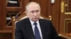 FILE - Russian President Vladimir Putin is pictured in Moscow, Jan. 5, 2023. On Friday, the International Criminal Court issued a warrant for Putin's arrest for war crimes because of his alleged involvement in the abduction of children from Ukraine.