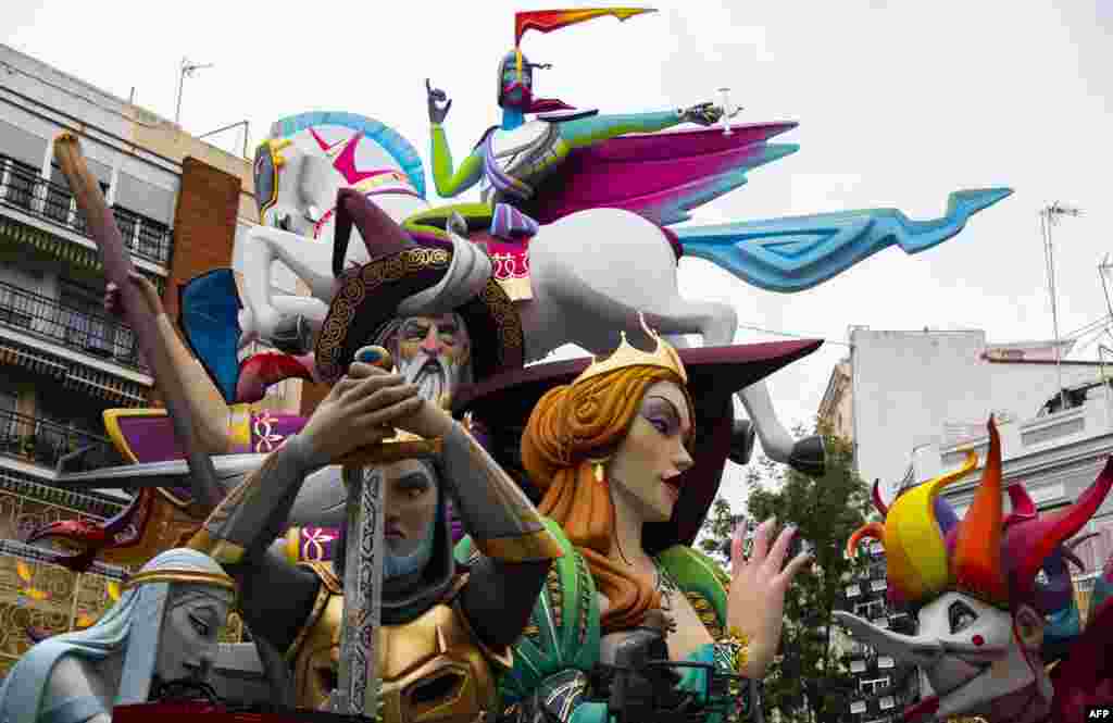 A 'falla' is pictured ahead of the Fallas festival in Valencia, Spain. The fallas, gigantic cardboard structures that portray current events and celebrities in which individual figures or ninots are placed, are burned in the streets of Valencia on March 19 as a tribute to San Jose (Saint Joseph), patron saint of the carpenters' guild. 