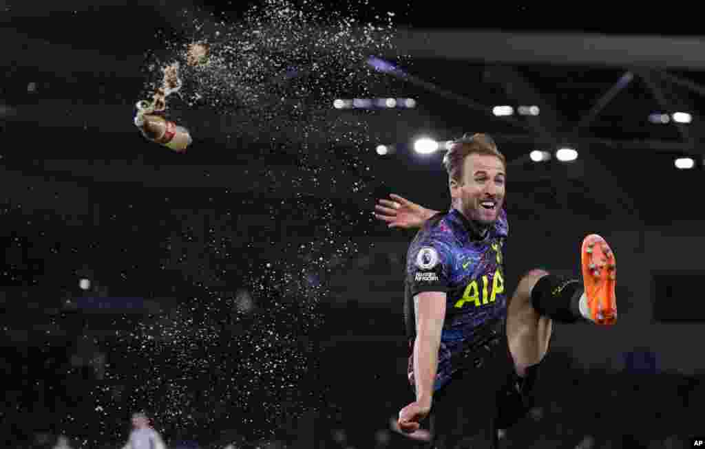 Tottenham's Harry Kane celebrates after scoring the second goal during the English Premier League soccer match between Brighton and Tottenham Hotspur at the Falmer stadium in Brighton, England, March 16, 2022.
