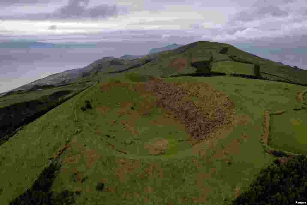 An aerial view shows a volcano crater near Velas as small earthquakes have been recorded on Sao Jorge island, Azores, Portugal, March 30, 2022.
