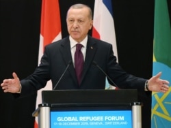 Turkey's President Recep Tayyip Erdogan delivers a speech during the UNHCR - Global Refugee Forum at the European headquarters of the United Nations in Geneva, Switzerland, Dec. 17, 2019.