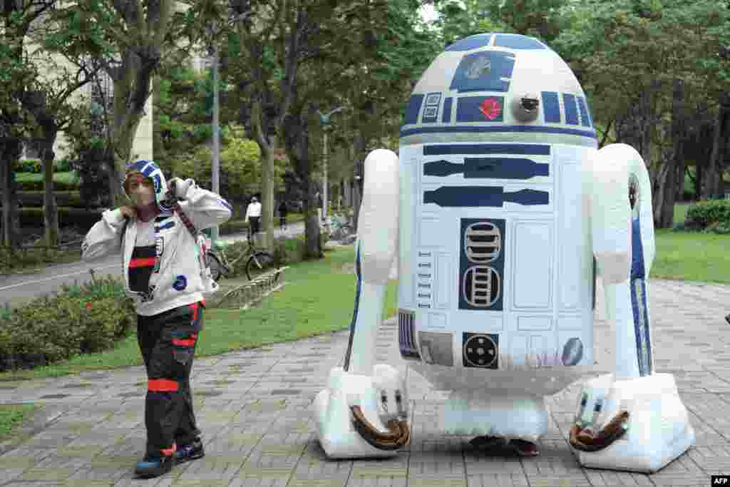 Star Wars fans appear in costumes at a local park to mark a "May the 4th be with you" event in Taipei, Taiwan.