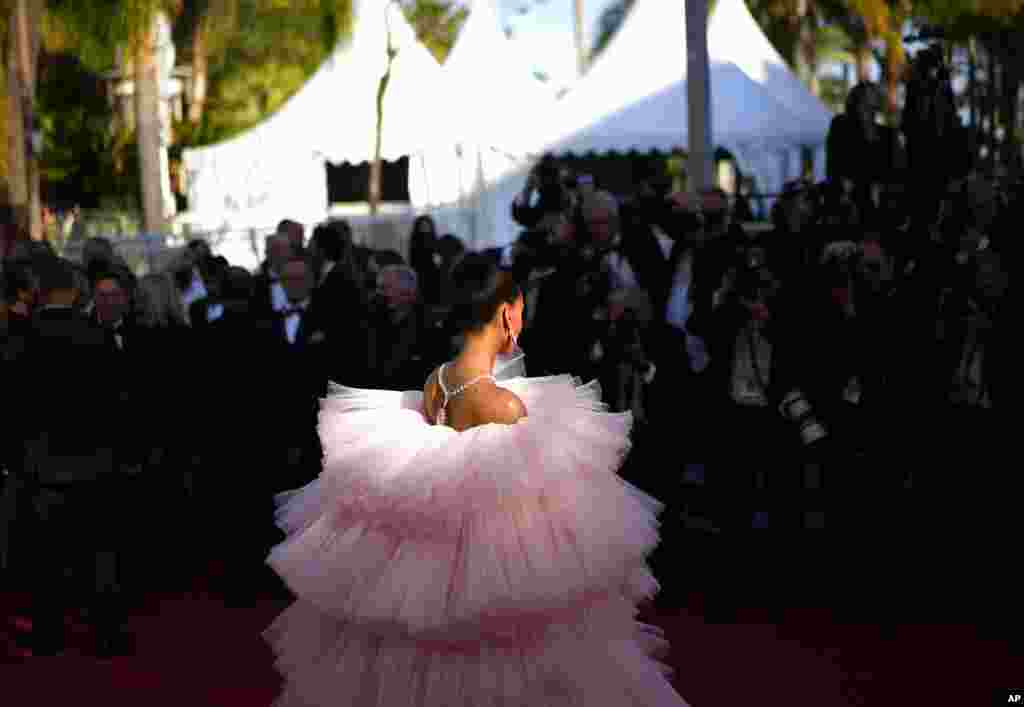 Cindy Bruna poses for photographers upon arrival at the premiere of the film "Armageddon Time" at the 75th international film festival, Cannes, southern France.