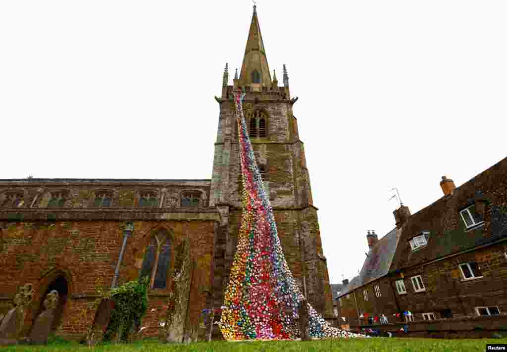 "Flower Tower," a display of more than 4,300 handmade knitted and crocheted flowers is seen at All Saints Church, ahead of Platinum Jubilee celebrations for Britain's Queen Elizabeth, in Middleton Cheney.