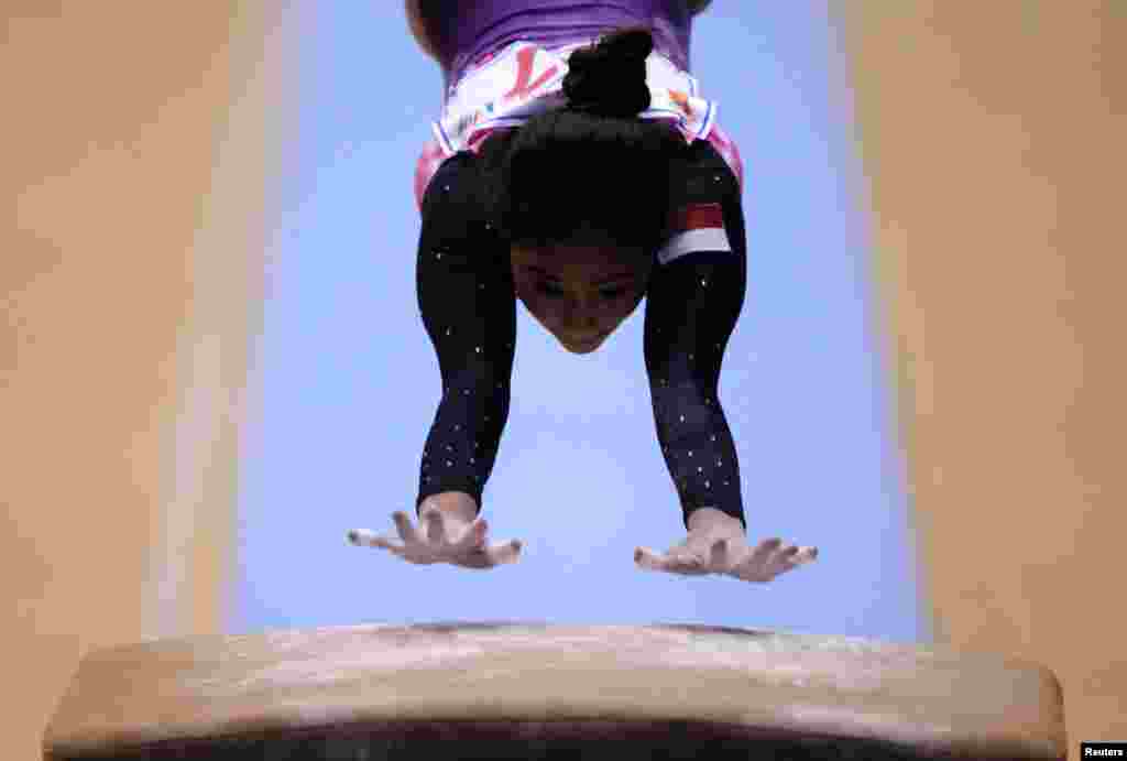 Rifda Irfanaluthfi of Indonesia competes in the women's artistic gymnastics during the Southeast Asian Games at Quan Ngua Gymnasium, Hanoi, Vietnam.