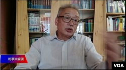資料照片：王維洛博士連線參加美國之音電視節目