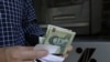 Iranian Currency Falls to Record Low Amid Isolation, Sanctions 