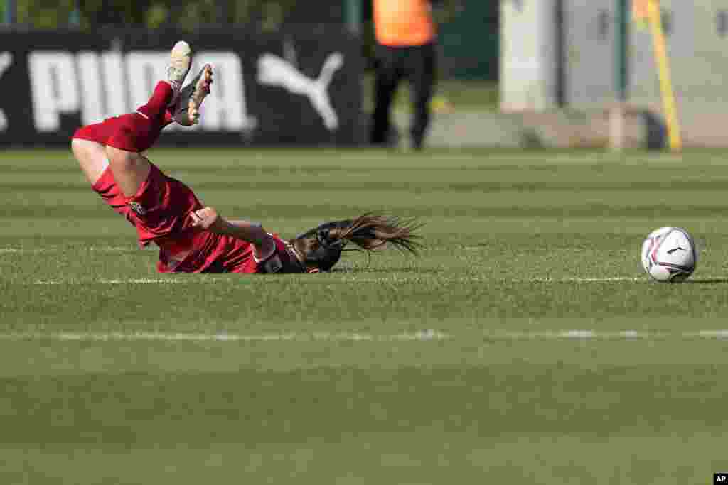 Serbia's Milica Mijatovic falls during the Women's World Cup Group H qualifying soccer match between Serbia and Germany at Sports Center of FA of Serbia stadium in Stara Pazova, near Belgrade, Serbia.