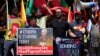 FILE - Members of the Tigrayan community protest against the conflict between Ethiopia and Tigray rebels in Ethiopia's Tigray region, outside the the United Arab Emirates embassy in Pretoria, South Africa, Oct. 12, 2022. 
