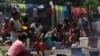El COVID-19 amenaza a decenas de miles de refugiados venezolanos en Brasil