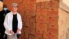 FILE - Cindy McCain, U.S. ambassador to the U.N. Agencies in Rome, inspects donations at the World Food Program warehouse during her visit to a refugee camp in Turkana county, Kenya, March 17, 2022. McCain will take over as executive director of the WFP next month.