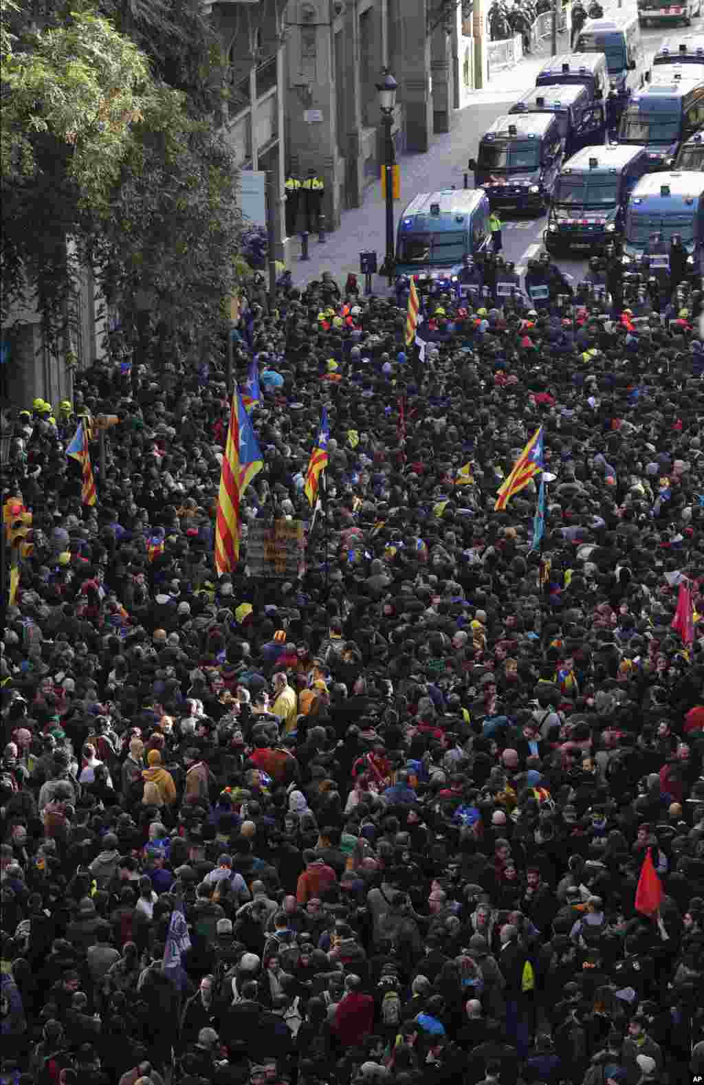 Pro-independence demonstrators protest against Spain's cabinet holding a meeting in Barcelona, Spain.