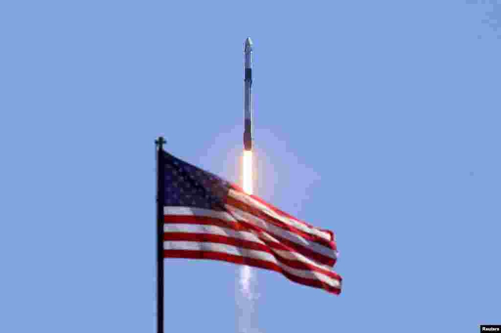 Axiom&#39;s four-man team lifts off, riding atop a SpaceX Falcon 9 rocket, in the first private astronaut mission to the International Space Station, from Kennedy Space Center in Cape Canaveral, Florida.