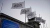 FILE - Taliban flags flutter at the airport in Kabul, Afghanistan, Sept. 9, 2021. 
