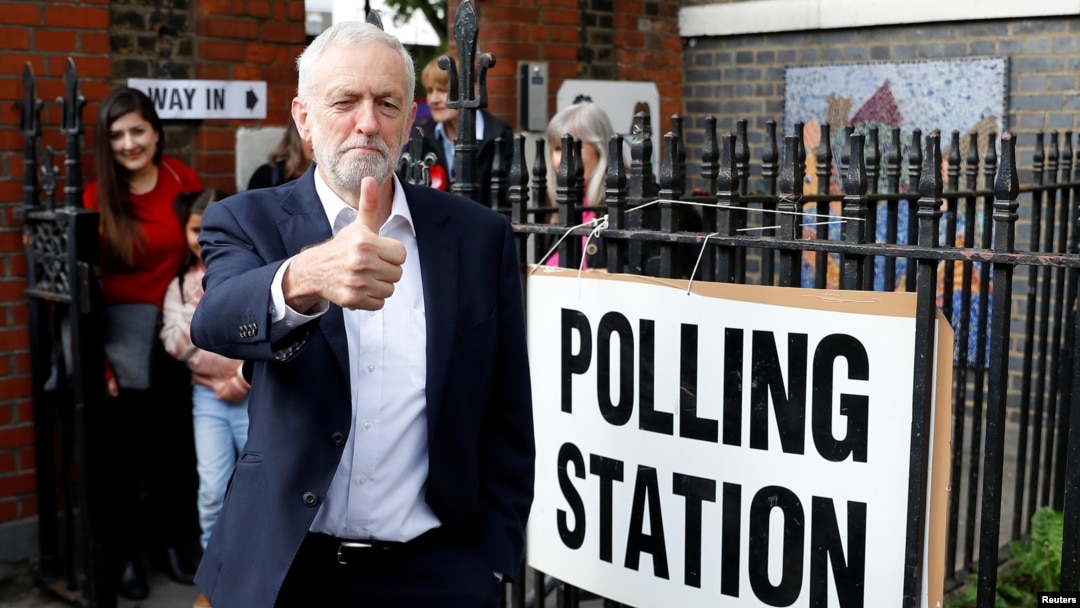 Britain's Labour Party leader Jeremy Corbyn gestures after voting at a local polling station in his constituency in London, May 23, 2019.