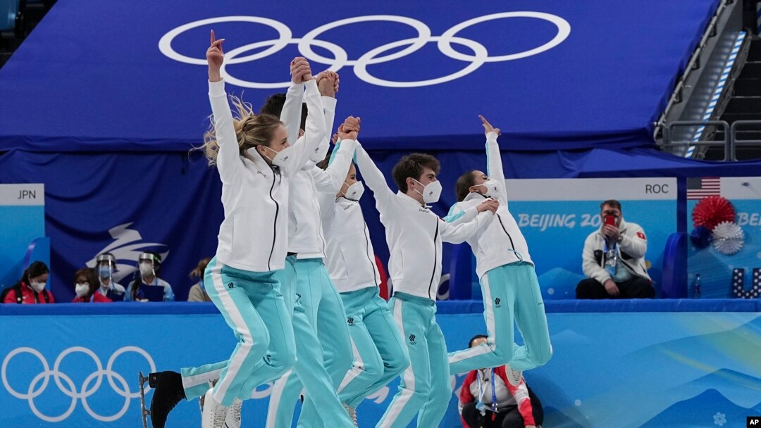 Gold medalists from the Russian team celebrates following the victory ceremony after the team event in the figure skating competition at the 2022 Winter Olympics, Feb. 7, 2022, in Beijing. 