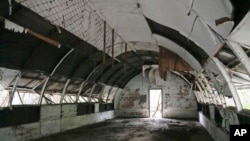 This photo shows abandoned concrete structures called 'Quonset huts' formerly used as barracks for US Marines in what used to be America's largest overseas naval base at the Subic Bay Freeport Zone in the Philippines, Feb. 6, 2023.