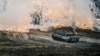 A Leopard 2 tank is seen in action during a visit of German Defense Minister Boris Pistorius at the Bundeswehr tank battalion 203 at the Field Marshal Rommel Barracks in Augustdorf, Germany, Feb. 1, 2023. 